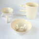 Illustration for article titled Oh good, a mug with a handle made of human fingers